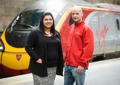 Preston train manager Matt Litton with Sanaa Shahid after stopping a man racially abusing her. Matt was then commended in the Frontline Employee of the Year category