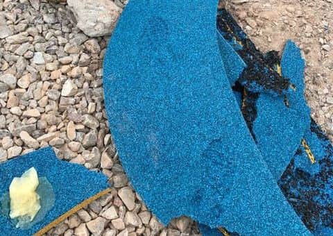 Footprints can be seen in the pieces of flooring workmen had to cut out at a playground being constructed in Morecambe. Picture: Michelle Blade.