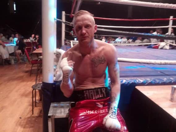 Mick Hall celebrates after his stoppage win