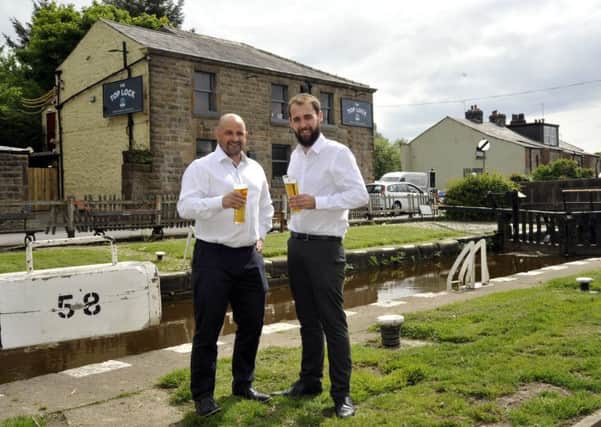 New licensee Mike Hales and his manager Curtis Lunt at the newly refurbished Top Lock Pub in Wheelton