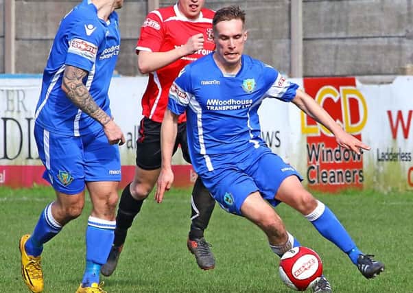 Billy Akrigg has joined the majority of Lancaster Citys title-winning side in signing up for next season.
