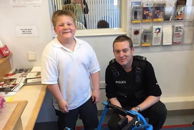 Sam was thrilled to meet police officers