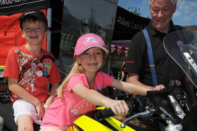 Preston Fire Station hosted an emergency services open day.
Connor and Katie Heath try out Frank Fitzgerald's Blood Service motorbike.  PIC BY ROB LOCK
18-6-2017