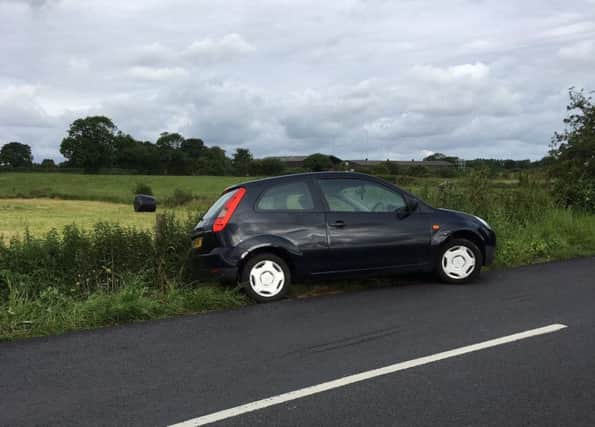 A car found off the road in Catforth. Photo: Lancs Roads Police