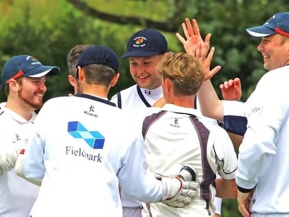 Vernon Carus celebrate a wicket against Torrisholme at Boundary Meadow. Picture: Tony North