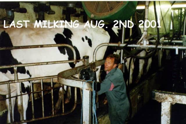 Raymond Smith at his final milking at White Coppice Dairy Farm which he gave up in 2000