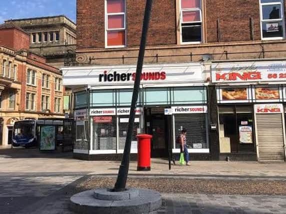 The lamp-posts on Church Street have been removed