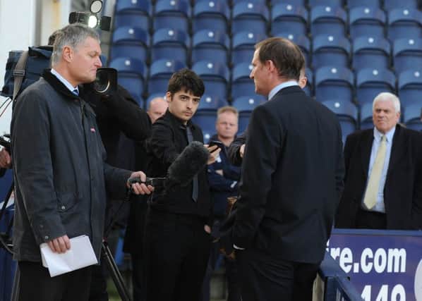 Simon Grayson is interviewed on television after getting the Preston job in February 2013