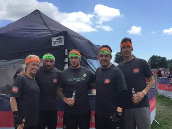 Tracy Shortt, Zip Water UK's Dan Callaghan, Michael Quinn,  Robbie Ferguson and Jody Lowe take part in Tough Mudder for St Catherine's Hospice