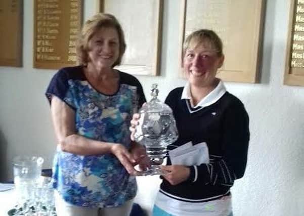 Pic: Comeback Queen; Sam Durnian, right, is presented with the Centenary Trophy by ChorleyGC Lady Captain Pauline Forshaw.