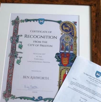 A certificate to 38-year-old Ben Ashworth making him a Friend of the City by Preston Council.