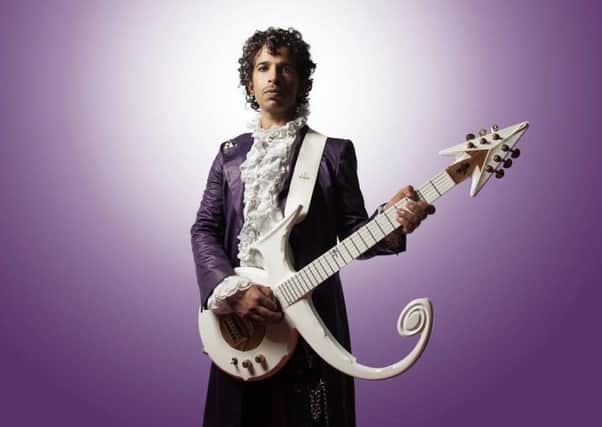 Jimi Love as Prince with the band Purple Rain