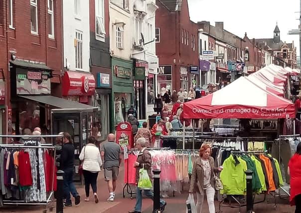 A view of the market stalls on Chapel Street. Chorley is famous for its markets, which date back to 1498