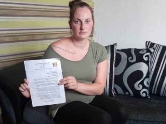 The 27-year-old received a letter from her employer barring her from visiting or contacting anyone from the school pending an investigation.