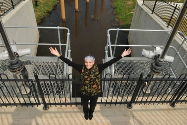 Photo Neil Cross
Kath Almond of Lower Yarrow Flood Action Group celebrates the official opening of Â£7 million Croston Flood Risk Management Scheme