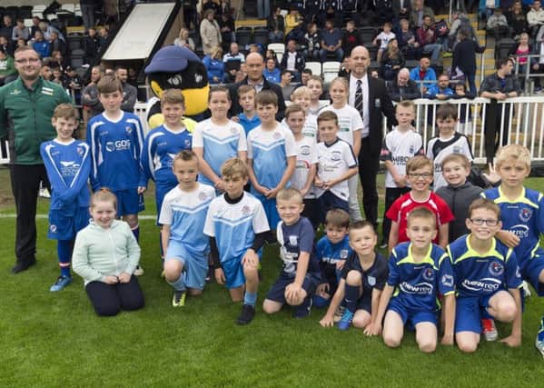 Preston manager Alex Neil and Bamber Bridge boss Neil Reynolds with the mascots before PNE's friendly at Brig