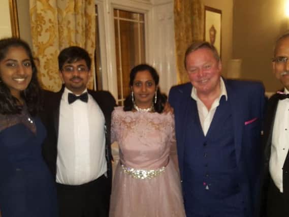 Dr Jeyaram Srinivasan, far left, with daughter Advaita, son Adhitya, wife Krishna and Ted Robbins