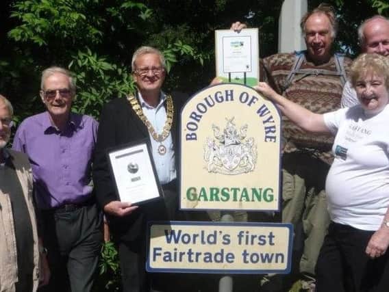 The Garstang Fairtrade steering committee with Garstang Mayor Peter Ryder