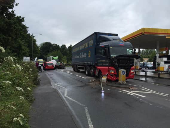 Police say that two cars a van and a lorry collided on Wigan Road near to the Shell garage at around 12.55pm.