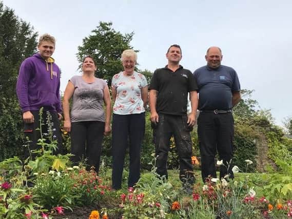 Members of Garstang and Preston Motor Club Andrew Richmond., Samantha Richmond, Margaret Duckworth, Dave Nolan and Ian Richmond have revamped the garden at the Space Centre