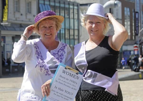 Members of WASPI campaign in St John's Square.  Pictured is Hilary Birchall with Grace Baron.