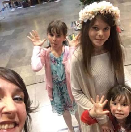 'One last selfie' Ben Ashworth's wife Louise and his three daughters take a selfie at his celebration service at Blackburn Cathedral.
