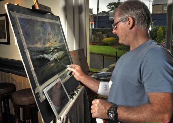 Les Darlow from Blackpool draws Jeffrey Hill at the 'Create Longridge' art festival