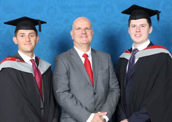 Grads:  policing graduate  Howard Weston,with  George Fawcett and Andrew Cummings