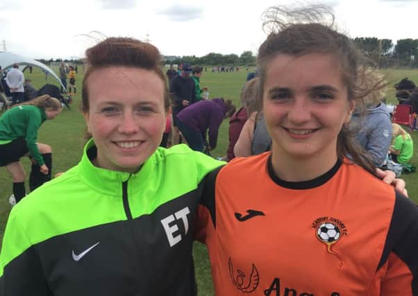 Goalkeeper Imogen Maguire with coach Emma Thompson (left)