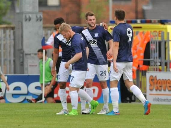 Tom Barkhuizen is congratulated on his goal against his former club.