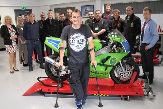 John McGuinness meets staff and students at the Myerscough College motorcyle centre.