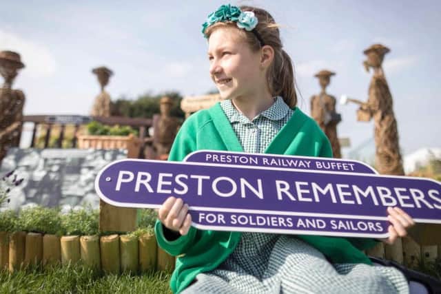 Preston Railway Free Buffet for Soldiers and Sailors garden. The exhibit has been made by children , vererans and people living with dementia. They have worked together on recreating a scene from WW1. Pictured is Julia Sazon , ten , from Lea Community Primary Schhol , Preston.
Picture by Mark Waugh / RHS