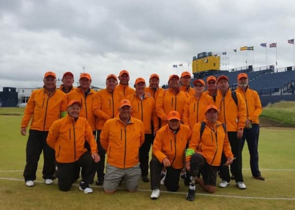 We're in charge . . . Leyland Golf Club volunteers on the 18th at Royal Birkdale