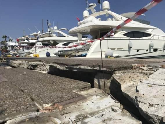 A huge crack is seen in the harbour after an earthquake in Kos