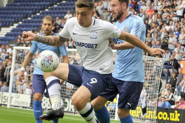 Jordan Hugill shields the ball against Newcastle at Deepdale. Pic: Kevin McGuiness