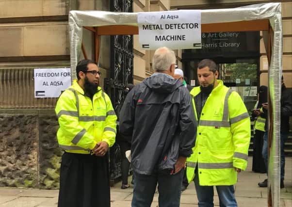 The campaigning group 'Children of the Ghetto' set up a symbolic security and metal detector checkpoint entering the Harris Library on Saturday 22nd July 2017. The group setup the checkpoint for just half an hour, on Saturday afternoon, as an act of solidarity with what has been happening at Masjid Al Aqsa in Jerusalem, Israel.