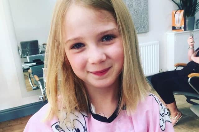 Ava Stones with her new hair cut