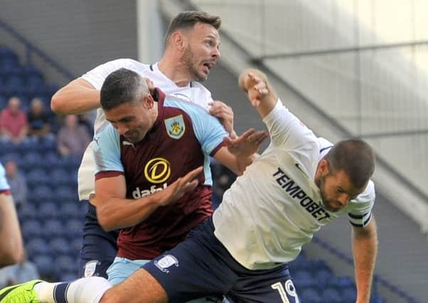 Andy Boyle and John Welsh sandwich Jon Walters in PNE's friendly clash with Burnley