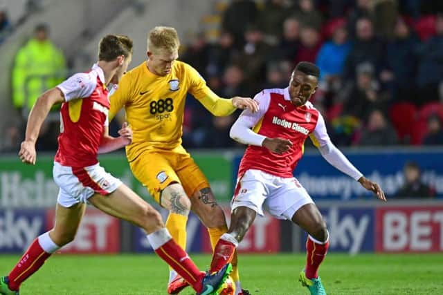 Darnell Fisher (right) in action for Rotherham against PNE at the New York Stadium last November
