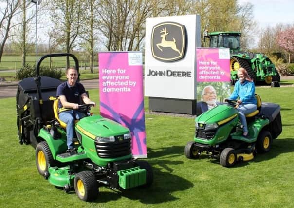 Andy and Kathryn Maxfield, from Inskip, are planning to break the Guinness World Record for driving from John OGroats to Lands End on a lawn tractor, while also raising money for Alzheimers Society.