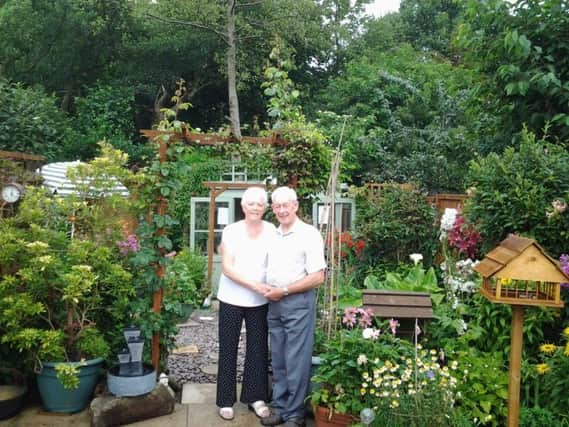 Morris and June Eccles, with their garden in Fulwood