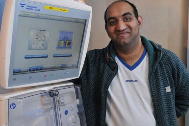 Photo Neil Cross
Faizan Awan, 31, who was born with a kidney condition and is on dialysis waiting for his 3rd kidney transplant, in his bedroom with his dialysis that he has named Big Bertha