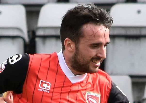 Aaron Wildig twice came close to scoring for Morecambe