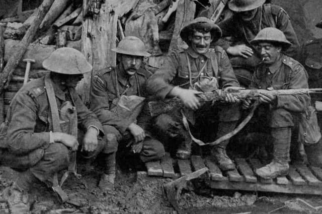 Guardsmen wait in the Passchendaele mud in October 1917