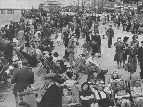 A crowded Blackpool seafront in the 1950s
