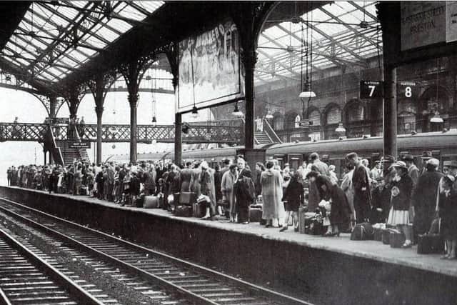Crowded Preston station platforms in July 1957 during the Wakes Week exodus to the seaside