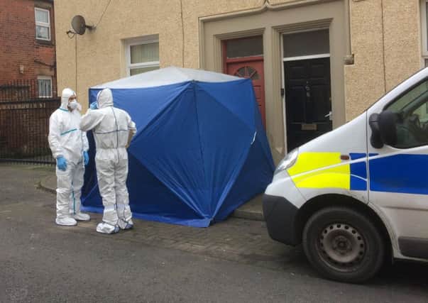 Police at murder scene at Chatsworth Street, Preston