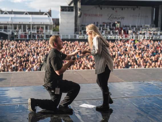 Glenn Austin pops the question to Kelly Norris at Lytham Festival - in front of a crowd of thousands
