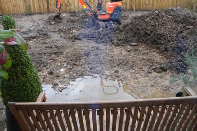 The flooding from the garden in Mr Robin Watson's home in Clematis Drive in Garstang, part of the Redrow Canal View development