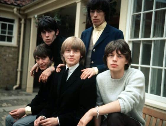 The Rolling Stones in 1964 from left to right: standing: Keith Richards, Bill Wyman, front: Charlie Watts, Brian Jones and Sir Mick Jagger
